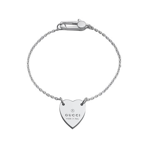 gucci heart bracelet with gucci trademark